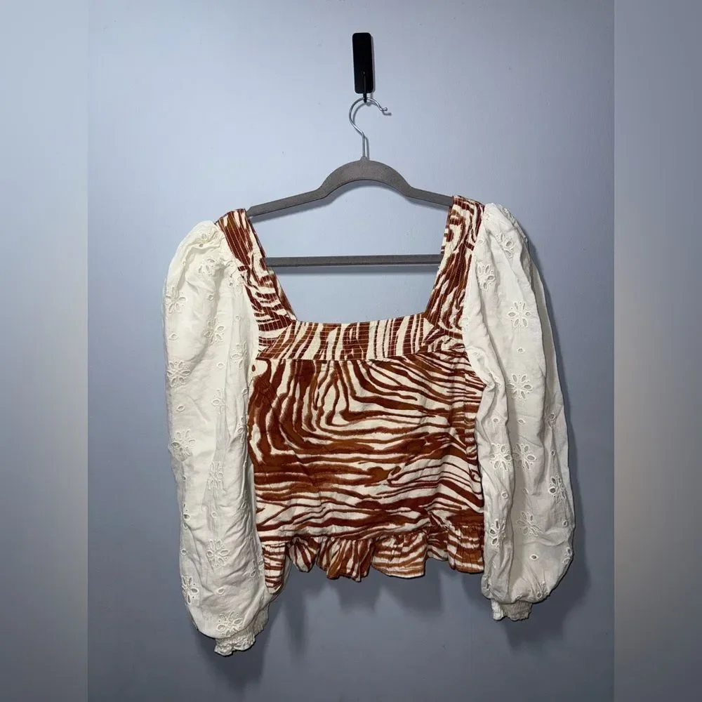 Anthropologie love the label Zebra Print Eyelet Puff sleeve smocked blouse S EUC
